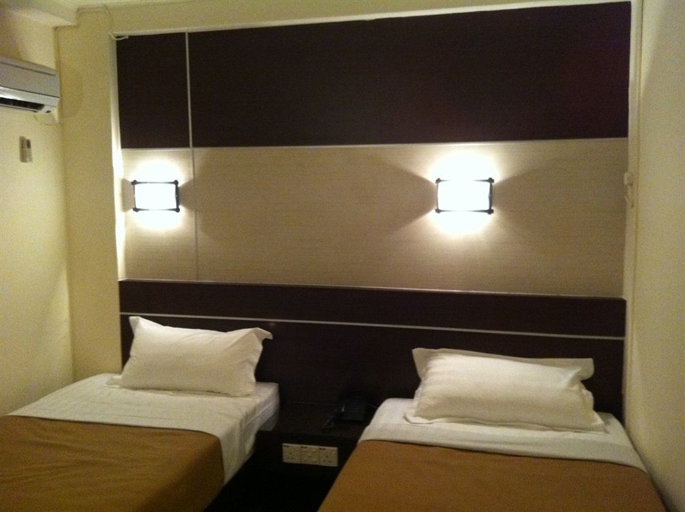 City Inn Кучинг Экстерьер фото