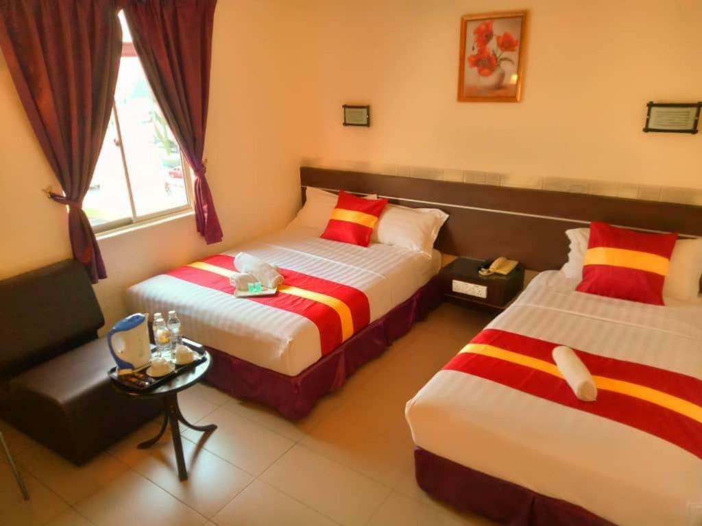 City Inn Кучинг Экстерьер фото